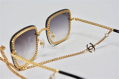 chanel sunglasses with chain harrods|CHANEL .